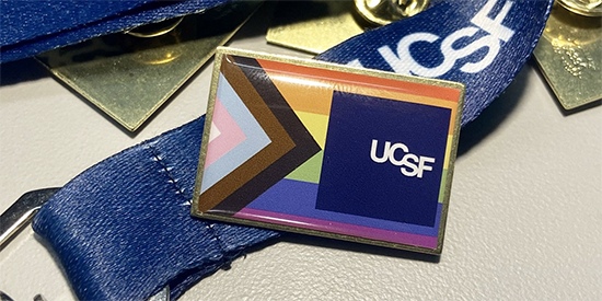 A photo of the UCSF pride pin