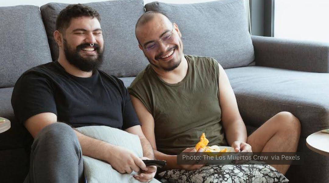 Two gay latino men enjoying an evening at home